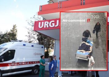 Në gjendje të rëndë pacienti  nxirret në oborr në mes të shiut, te spitali ‘Nënë Tereza’.  Bashkë me krevatin dërgohet te skaneri